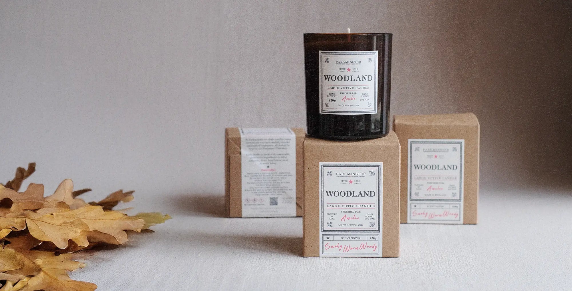 Parkminster Woodland Large Votive Candle, a natural soy wax scented candle with a warm, woody fragrance, available in 26 exclusive in-house fragrances.