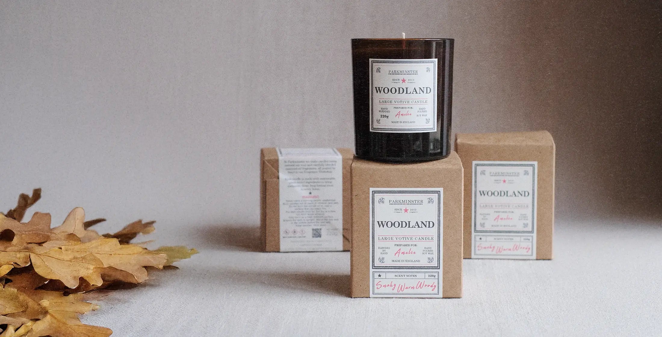 Parkminster Woodland Large Votive Candle, a natural soy wax scented candle with a warm, woody fragrance, available in 26 exclusive in-house fragrances.